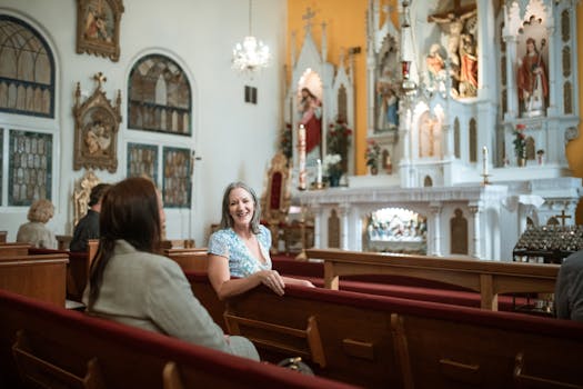 Friendly conversation inside a beautifully adorned historic church.